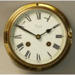 Devina - a brass ships bulk head type wall clock, with strike silent mechanism, diameter 15cm, key.