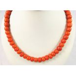 A Victorian coral bead graduated single row necklace, composed of 59 beads, from 7 to 5 mm diameter,