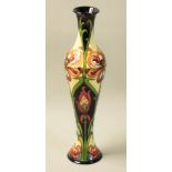 A Moorcroft 'Burslem Legacy' pattern tube line decorated vase, designed by Rachel Bishop,