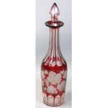 A 19th century ruby flash glass, with grape and vine acid etched decoration, height 36cm.