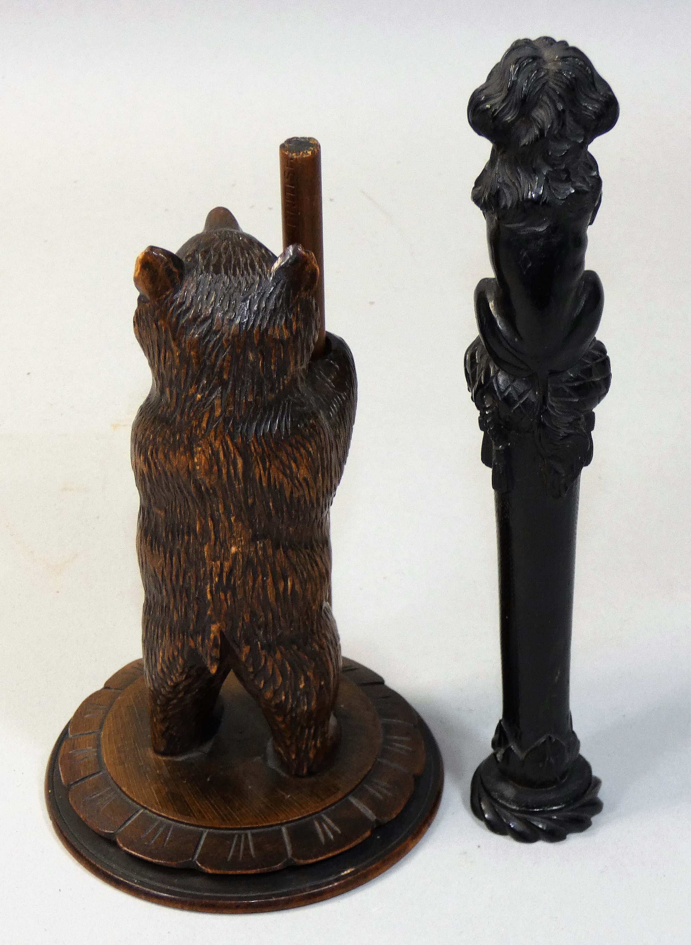 A 19th century French ebonised handle, carved in the form of a King Charles Spaniel upon a - Image 2 of 2