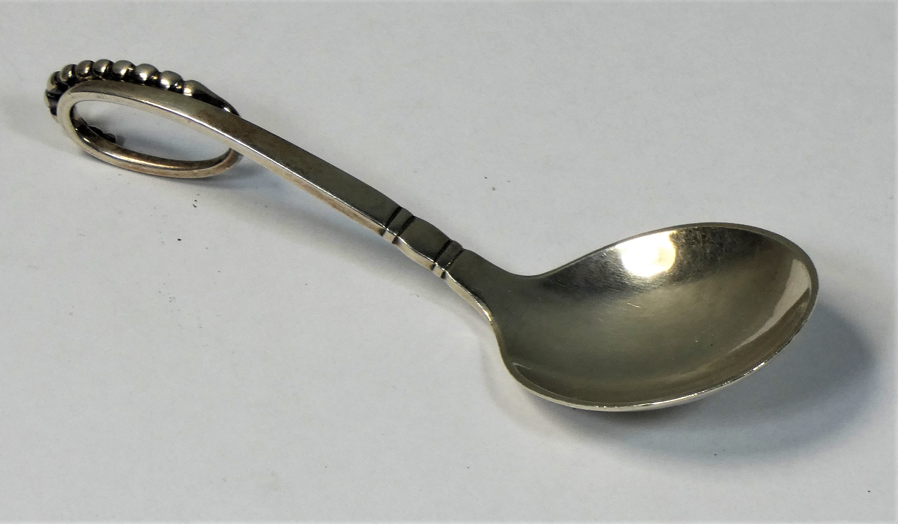 Georg Jensen, a Danish silver caddy or preserve spoon, Copenhagen, 1933-1944, pattern number 41,