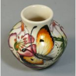 A miniature Moorcroft 'Butterfly Collection' pattern tube line decorated vase, designed by Emma