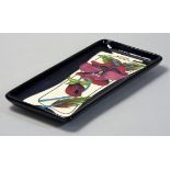 A Moorcroft 'Glory and Dreams' pattern tube line decorated rectangular tray, impressed factory marks