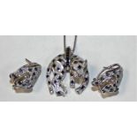 A 14k sapphire and diamond set leopard pendant and ear rings, set with square cut and single cut