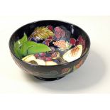 A Moorcroft 'Queens Choice' pattern tube line decorated bowl, designed by Emma Bossons, impressed