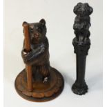 A 19th century French ebonised handle, carved in the form of a King Charles Spaniel upon a