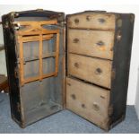 An American Belber wardrobe steamer trunk, c. 1925, with safe lock mechanism, opening to reveal a