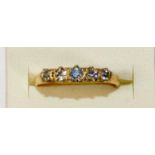 A gold five stone diamond ring, claw set with five graduated stones, approximately 1/3ct, weight 2.5