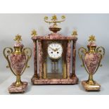 Lardot and Boyon, Paris, a 19th century French gilt metal and pink variegated marble clock