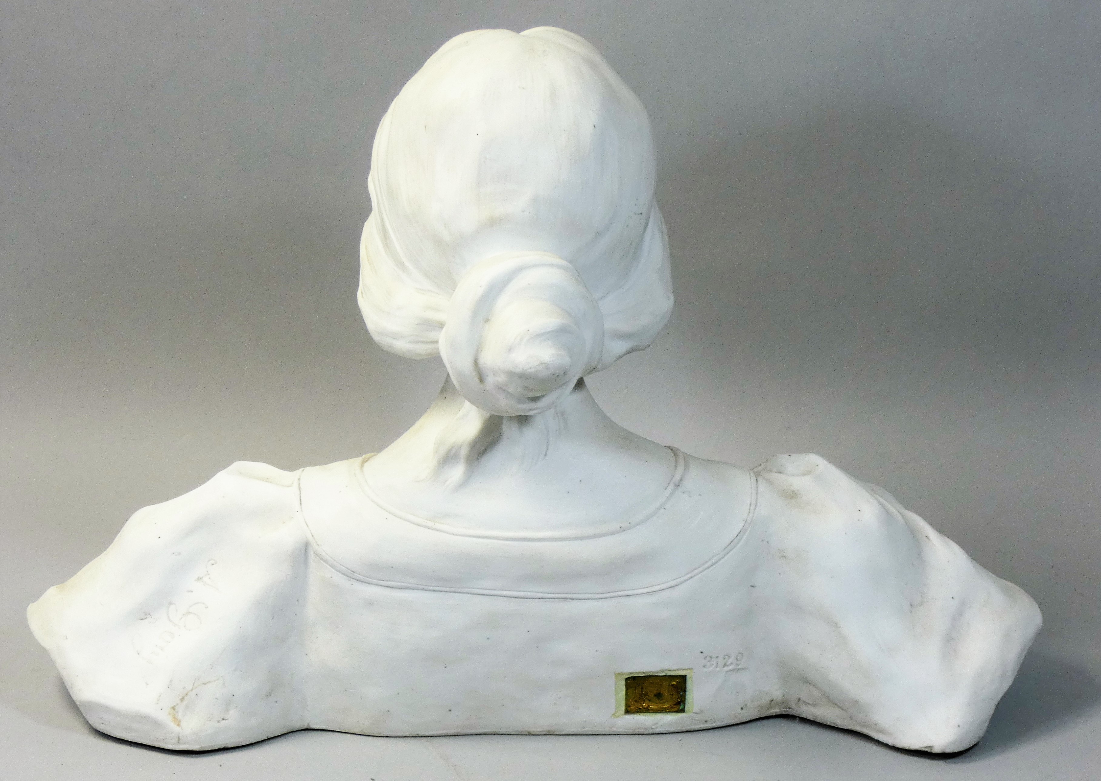 An Art Nouveau pottery bust of a maiden, by A Gory, model No. 3129, downcast contemplative gaze, her - Image 2 of 4