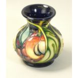 A miniature Moorcroft 'Queens Choice' pattern tube line decorated vase, designed by Emma Bossons,