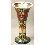 A Moorcroft 'Monarch's Crown' pattern tube line decorated vase, designed by Rachel Bishop, impressed