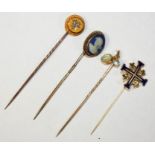 A Victorian gold stickpin inset with a diamond trefoil, an opal and aquamarine set stickpin, a