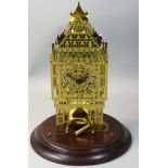 Franklin Mint - a brass skeleton clock in the form of a clock tower, with West German movement,