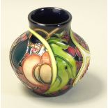 A miniature Moorcroft 'Queens Choice' pattern tube line decorated vase, designed by Emma Bossons,