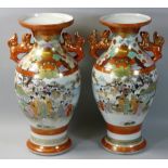 A Japanese pair of twin-handled Satsuma vases of baluster form, believed Meiji period, the handles