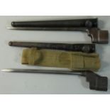 A WWII Savage Stevens No.4 MkII spike bayonet, with scabbard and another similar (2)