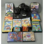 A Sega Mega Drive 16-Bit games console, together with ten boxed and three loose games including Rolo