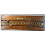 A snooker scoreboard by Hennig Bros Makers, London W.C. (71cm x 20cm)