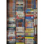 Approximately one hundred and thirty Commodore 64 cassette tape games in small cases, to include