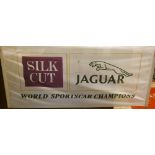 A Silk Cut Jaguar banner.
