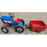 Triang, a child's tractor, with home built trailer.