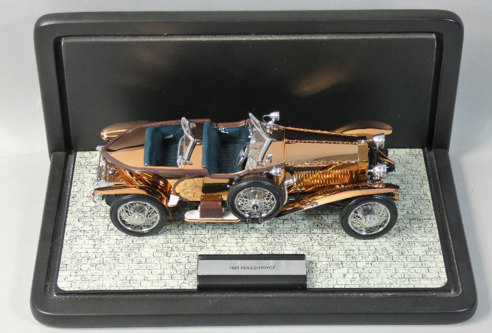 Franklin Mint precision model, 1:24 scale 1921 Rolls Royce "Silver Ghost", with a copper coloured