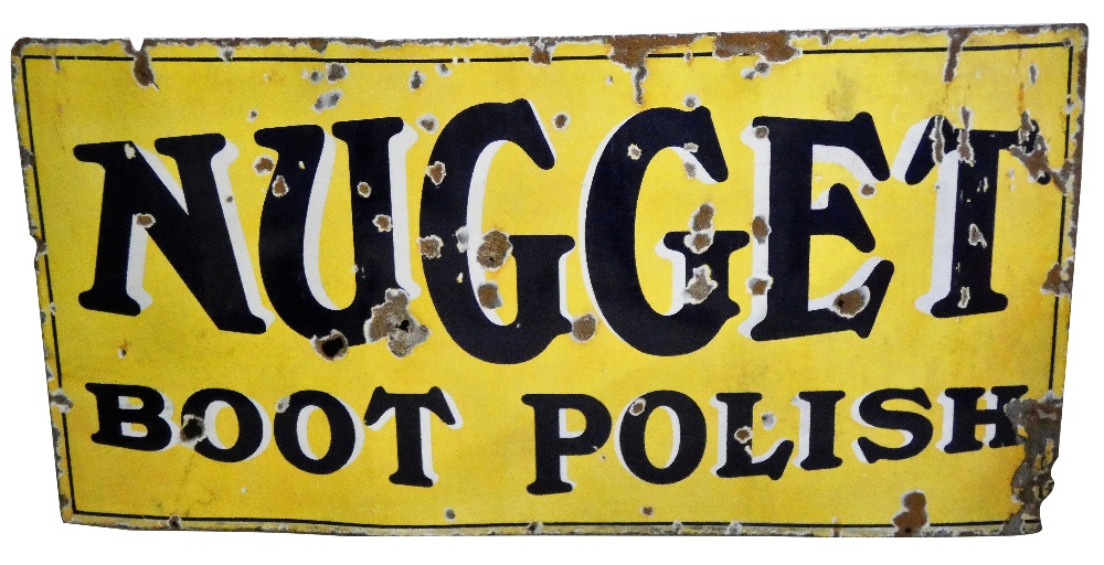 An advertising Nugget Polish, vitreous enamel sign, 63 x 122 cm.