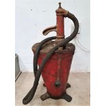 A vintage hand crank, oil pump painted red 70 cm.