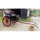 A Victorian Norfolk type cart, c.1901, with leaf sprung chassis, seat to the front with steps either