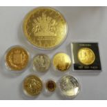 Eleven various gold and silver plated Commemorative coins (11).