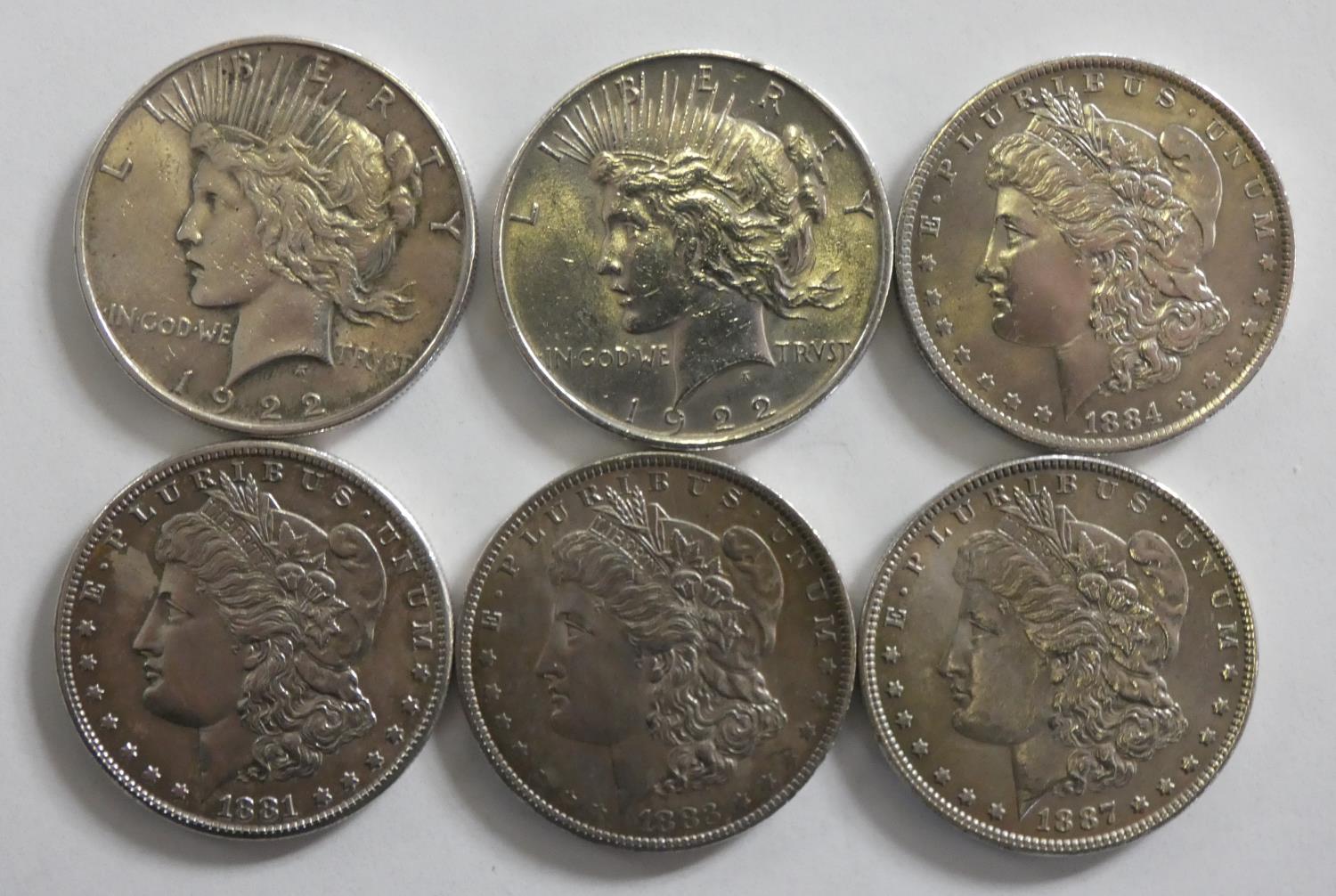 A collection of six silver dollar coins, 1881 San Francisco mint, 1883 and 1884 New Orleans mint, - Image 2 of 2