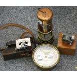 A circular brass cased Aneroid barometer from T.A. Reynolds & Sons & Wardale Ltd., London together