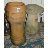 A terracotta chimney pot, together with a composite garden toadstool, 65cm tall (2).
