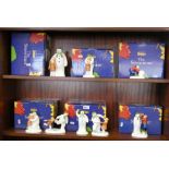A collection of eight Coalport characters "The Snowman" some boxed.
