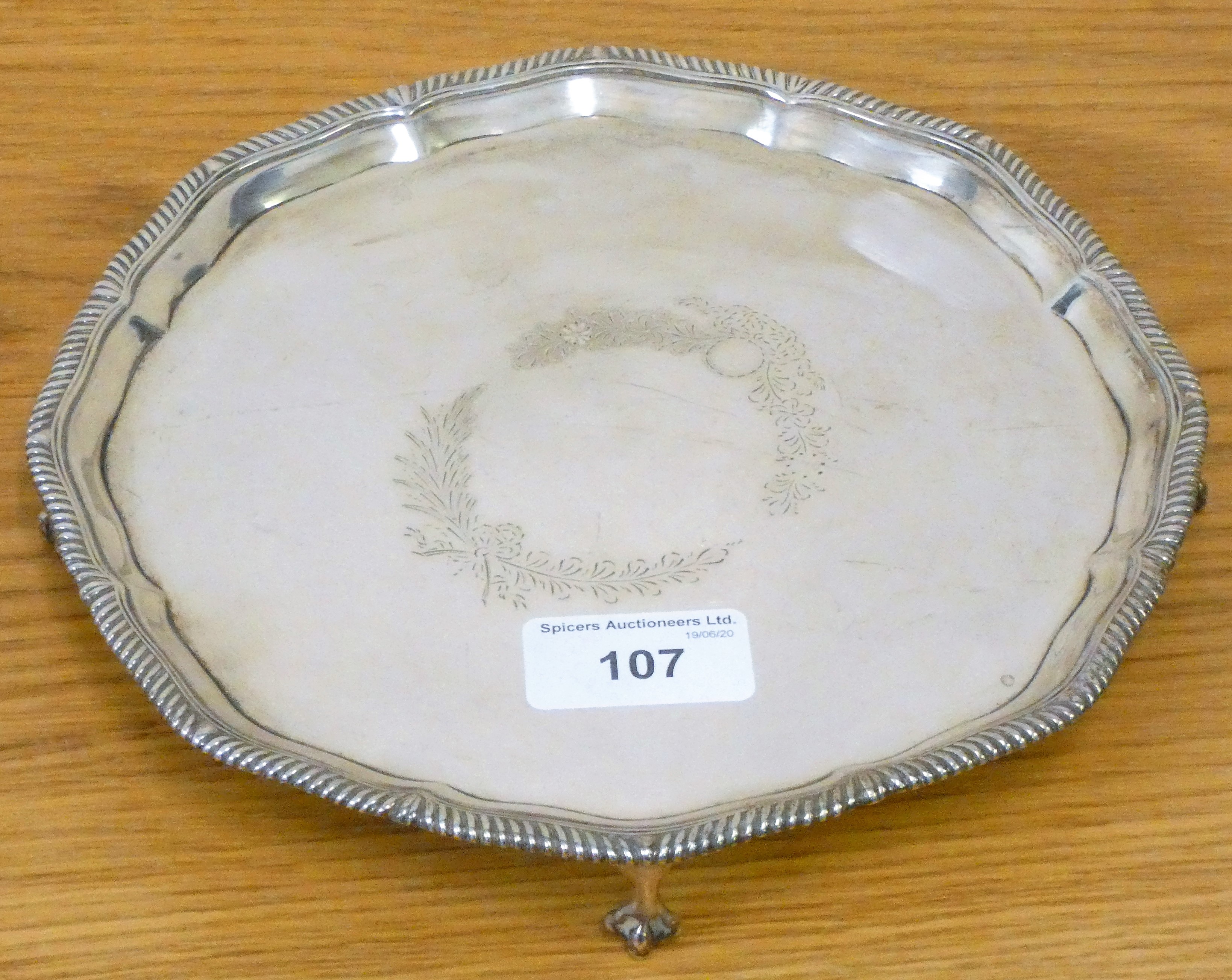 A Victorian silver salver, London 1883, retailed by Lambert Coventry Street, with gadrooned