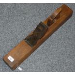 An antique primitive wood block plane hand planer, 56cm long