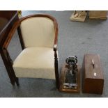 A Edwardian mahogany tub chair, together with a manual sewing machine (2).