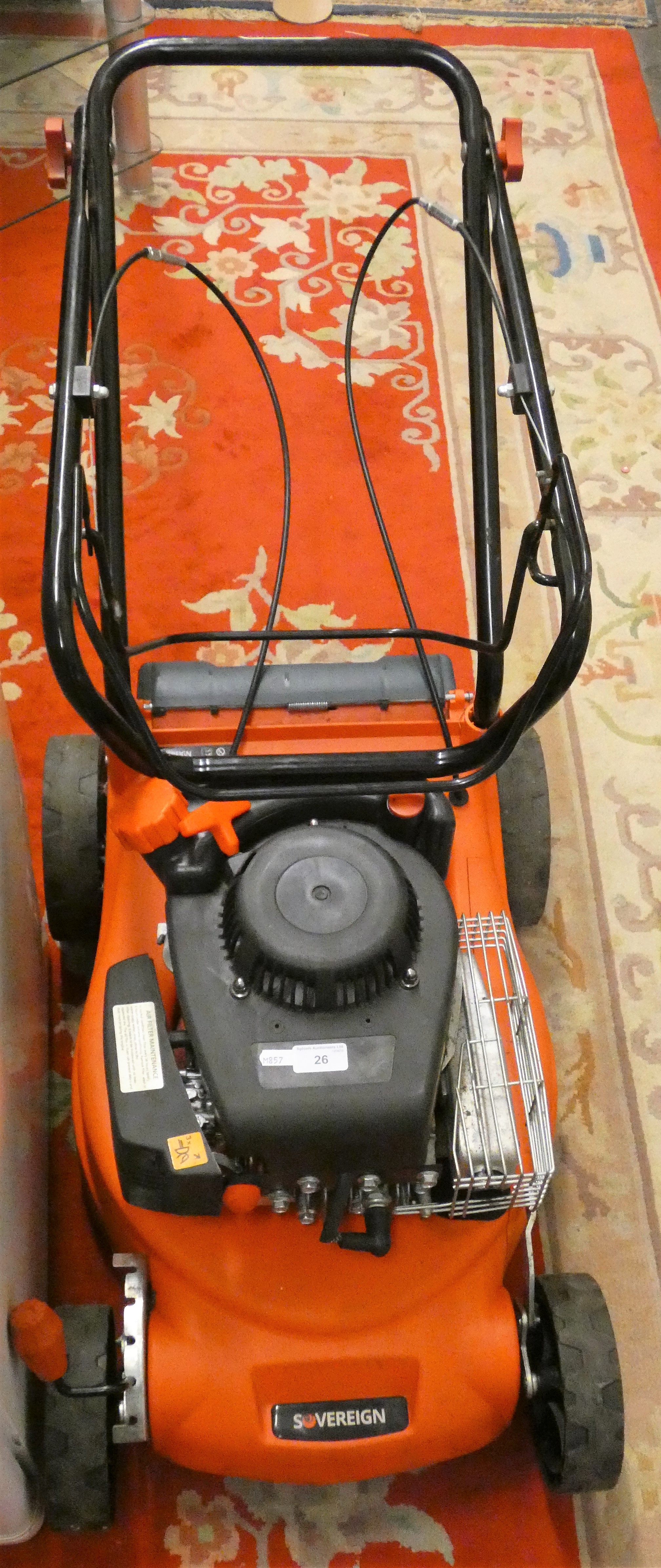 A Sovereign petrol lawn mower