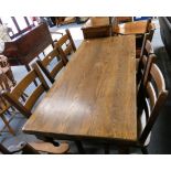 A substantial solid oak refectory dining table 183 x 75 cm, with a set of 6 matching dining