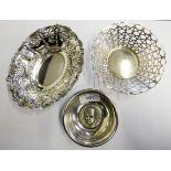 A Victorian silver oval embossed trinket dish Birmingham 1898, a pierced dish Birmingham 1964 and