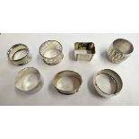 Seven various silver napkin rings, one with initials, various dates from Birmingham 1898, 5 oz (7).