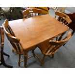 A Stained pine dining table 104 x 68 cm, together with a set of 4 pine matching dining chairs (5)