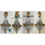 Four Edwardian electric wall lights mirror backed with glass droplets, gilt decoration 80 cm long (