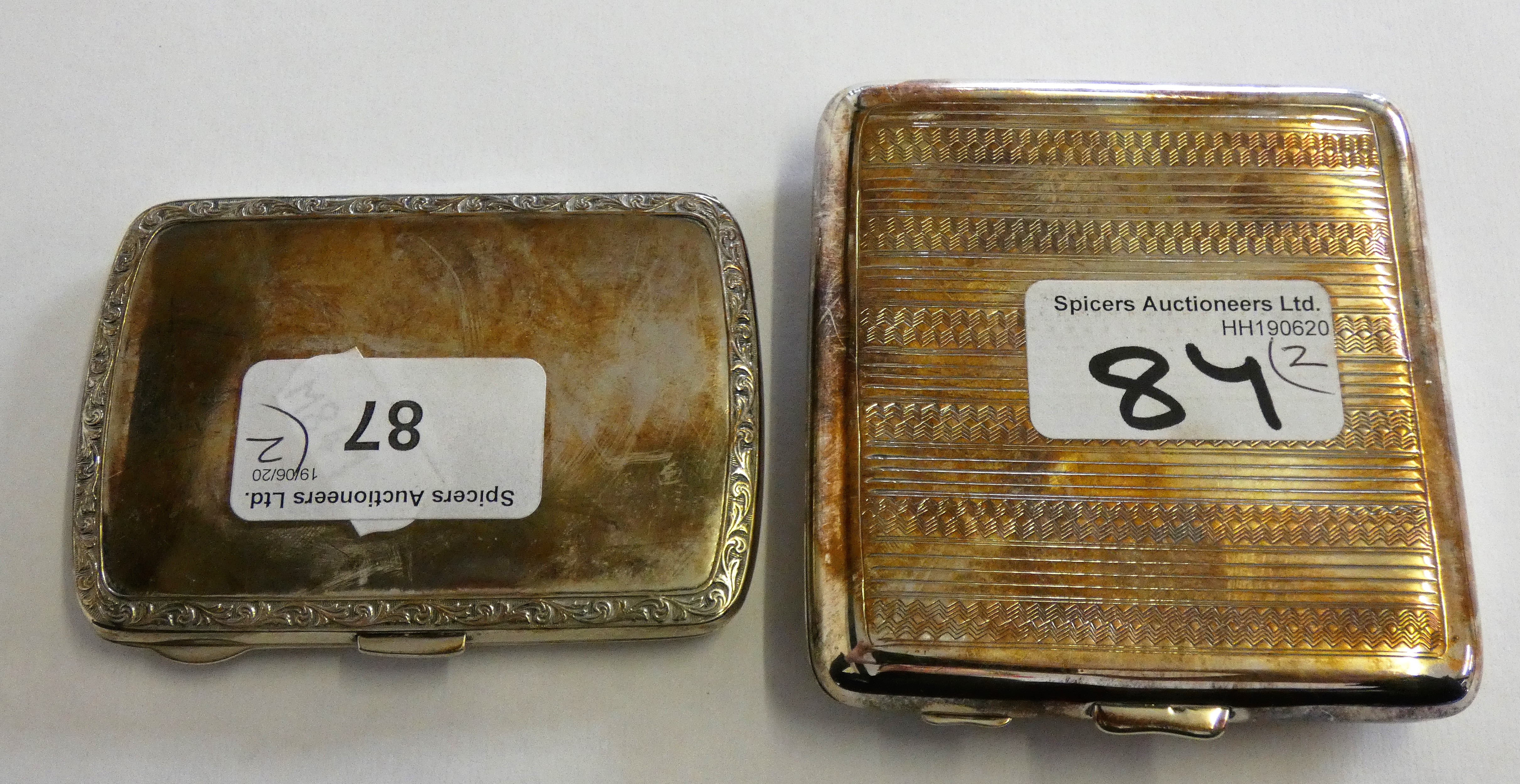 Two silver cigarette cases, Birmingham 1924 and 1919, weight 6 oz (2).