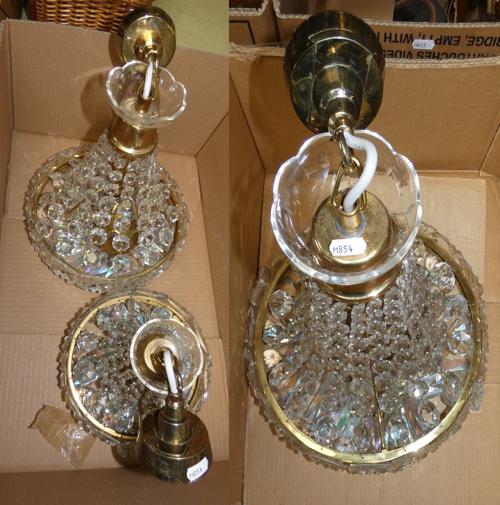 Three graduated cut glass chandeliers