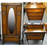 An oak single wardrobe together with two matching chest of drawers (3).