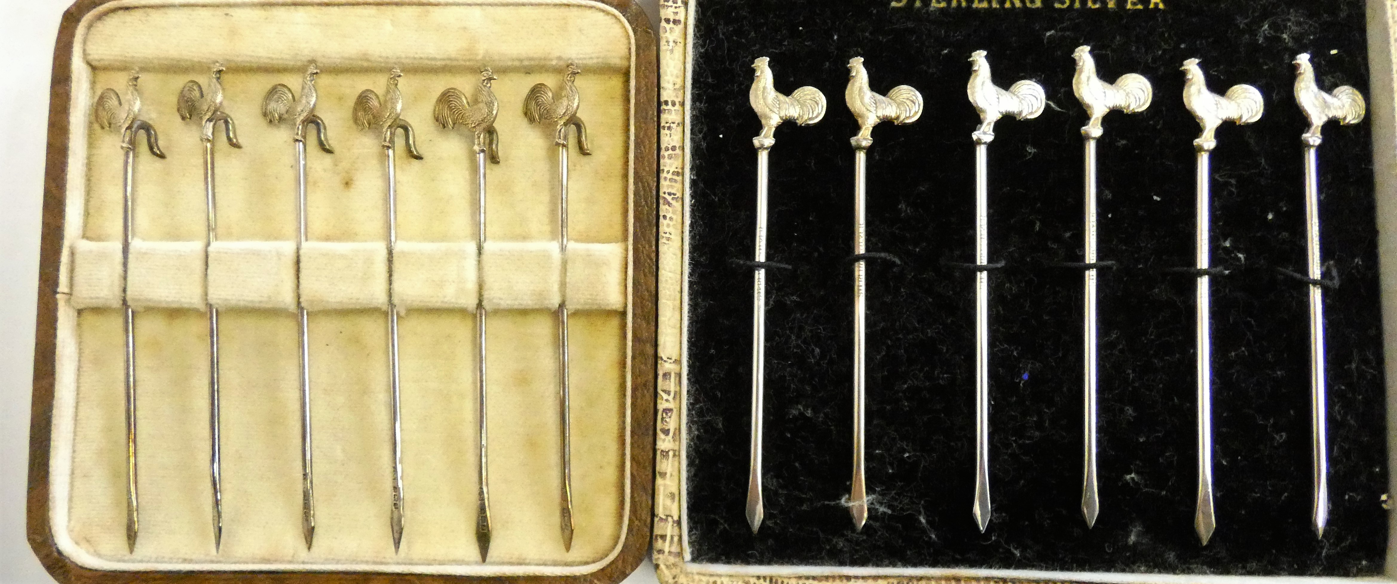 A silver set of cockerel cocktail sticks, Birmingham 1933, case and a sterling silver set, case (
