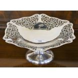 A silver pedestal fruit dish, by Viners, Sheffield 1939, with pierced and engraved floral
